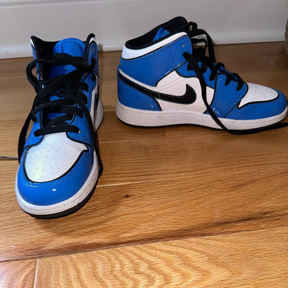 Patent leather baby blue and white jordans